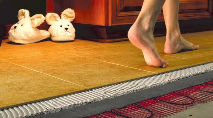  Features of the installation of a heated floor in a wooden house